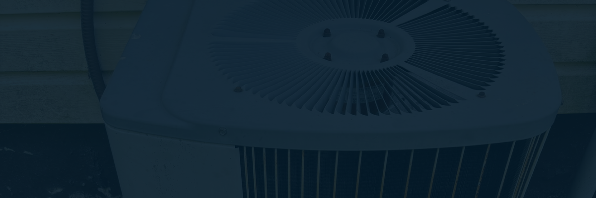 Air conditioning services in Lockport technician repairing AC unit
